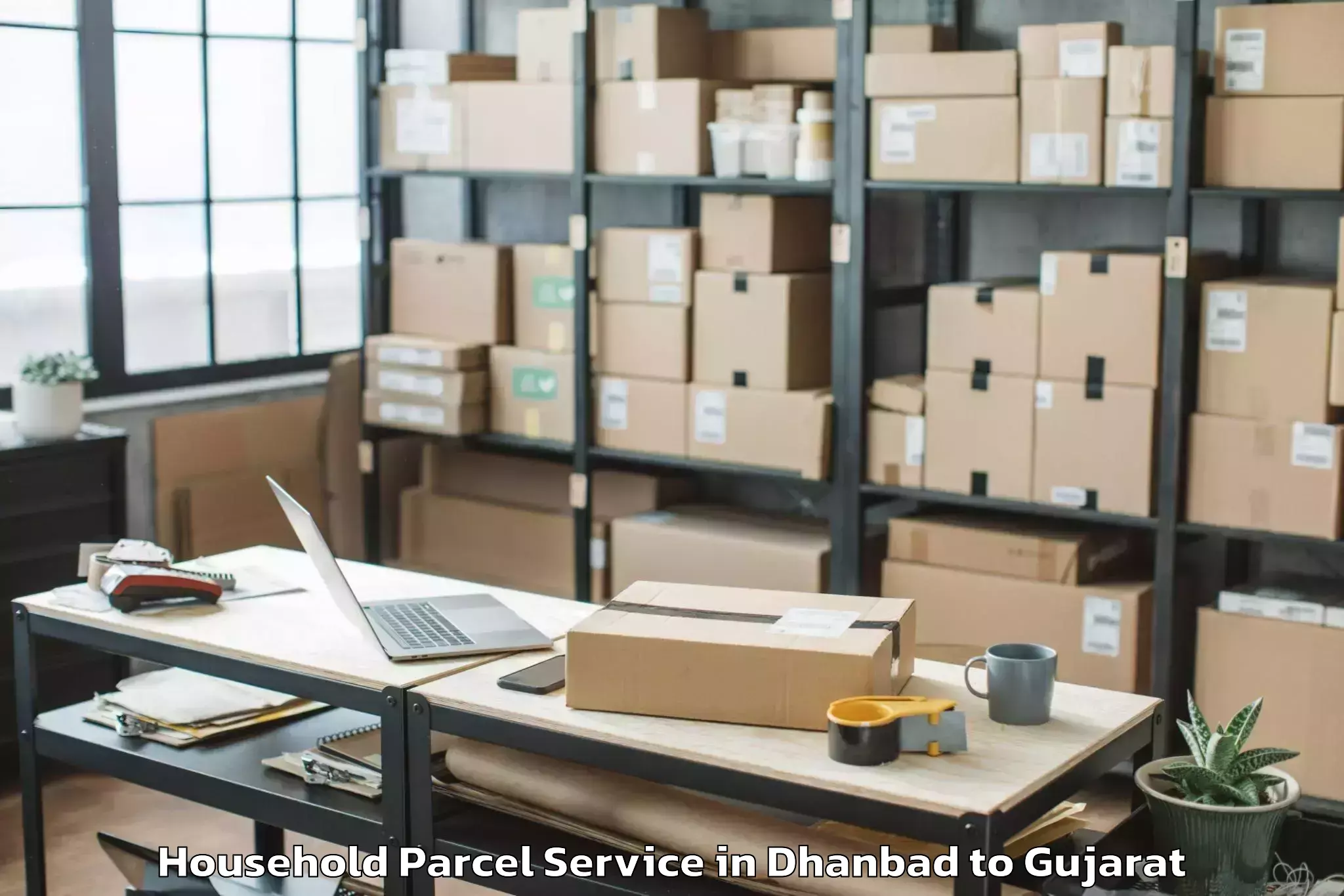 Book Your Dhanbad to Kadana Household Parcel Today